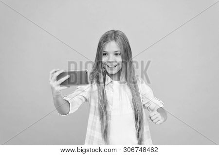 Video Call Concept. Girl Hold Smartphone Taking Selfie. Selfie For Social Networks. Streaming Online