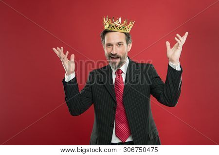 His Dream Of Being Champion Came True. Crowned Champion Smiling With Crown On Red Background. Happy 