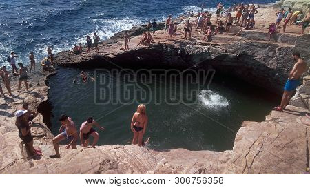 Thassos Island, Greece - 3 September 2018: People Enjoy Their Summer Vacation At Giola, Thassos, Gre