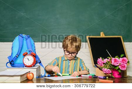 Schoolchild In Class. Elementary School. First School Day. Kids Gets Ready For School. Talented Chil
