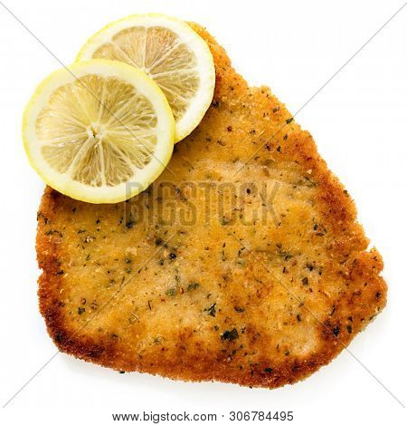 Schnitzel with lemon, top view, isolated on white.  
