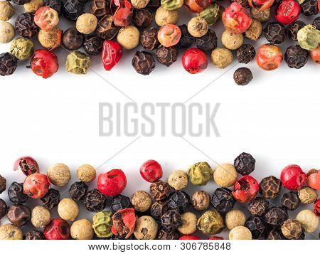 Mixed Peppercorns Background With White Copy Space In Center. Food Background With Peppercorns. Diff