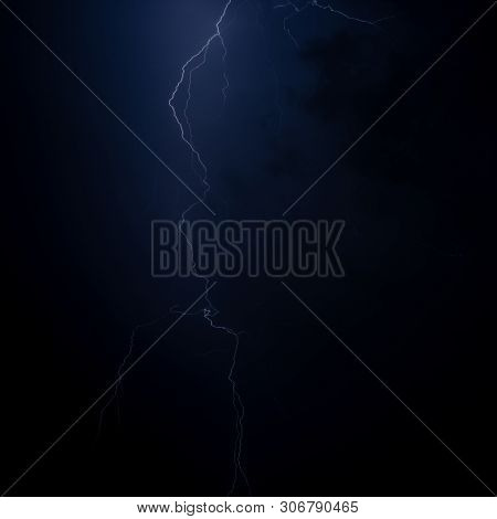 Lightning in the night sky during a severe thunderstorm