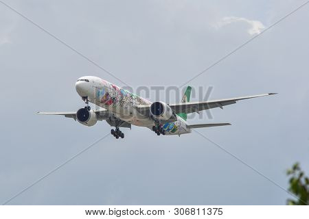 Passenger Airplane Landing At The Airport