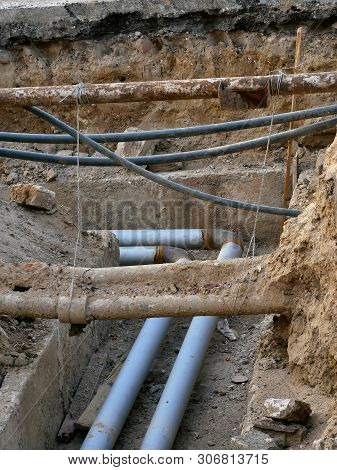 Underground Utilities, Excavated Pipes In The Ground