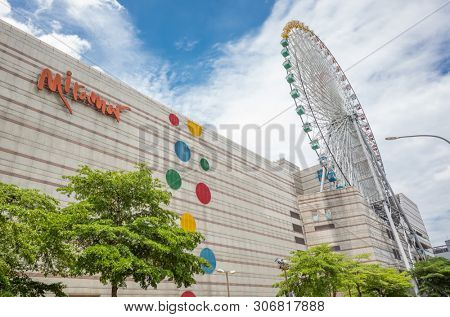 Taipei, Taiwan - Jun 8th, 2019: Ferris wheel and Miramar entertainment shopping mall in Dazhi, Taipei, Taiwan, Asia