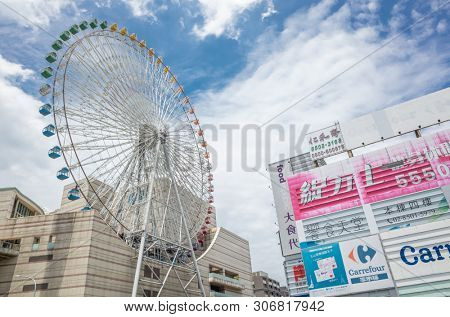 Taipei, Taiwan - Jun 8th, 2019: Ferris wheel and Miramar entertainment shopping mall in Dazhi, Taipei, Taiwan, Asia