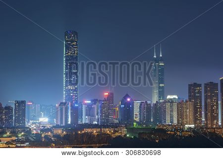 Skyline Of Shenzhen City, China At Twilight. Viewed From Hong Kong Border