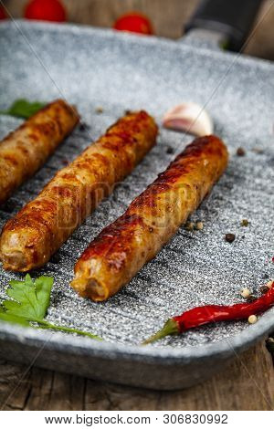Kupaty In A Frying Pan