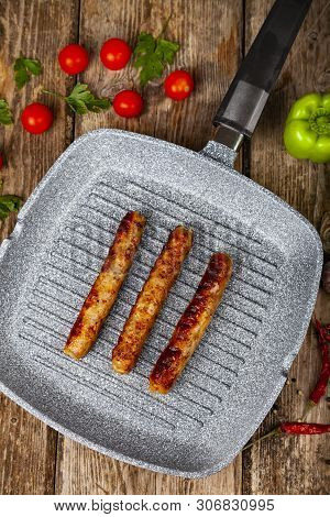 Kupaty In A Frying Pan