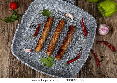 Kupaty In A Frying Pan