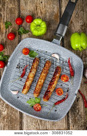 Kupaty In A Frying Pan