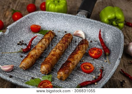 Kupaty In A Frying Pan