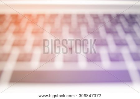 Blurry Image Of Key Pad On Keyboard Of Modern Laptop Computer