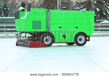 Special Machine To Clean The Ice At The Skating Rink.  Machinery For The Industrial Industry
