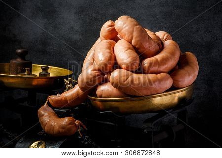 Big Bunch Of Raw Short Thick Wieners Rolled In Spiral On Scales