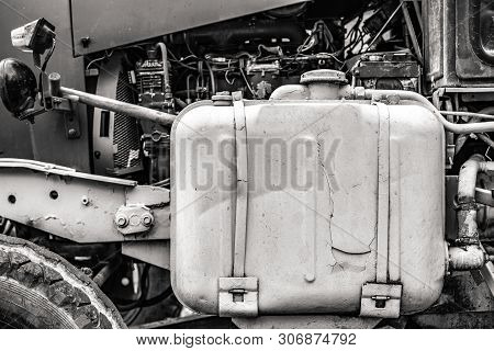 Old Motor As A Vintage Background. Engine Motor Of An Old Tractor.
