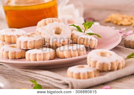 Canestrelli Biscuits With Mint On Wooden Table.