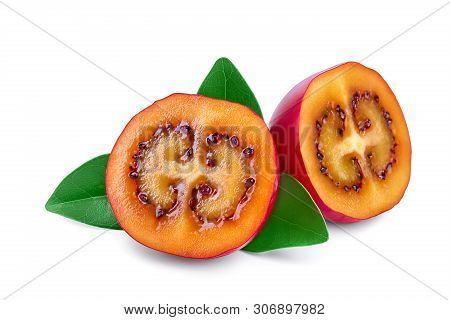 Fresh Tamarillo Half Fruit With Leaves Isolated On White Background
