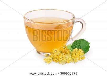 Tea From Linden Flowers In Glass Cup With Flower Clusters Of Lime Isolated On White Background