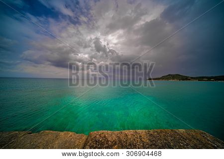 Stormy Dramatic Clouds Accumulating Over Alykes Bay In Zante Island, Greece
