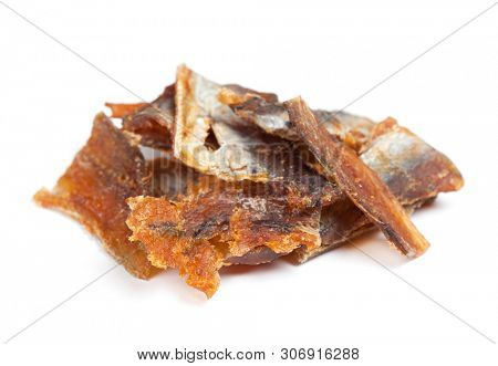Pieces of cleaned dried fish isolated on white (Dry Peppered Pollack)