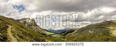 Scenic View Of Curator Lake In The Rocky Mountains, Jasper National Park, Alberta, Canada. Hiking Sk