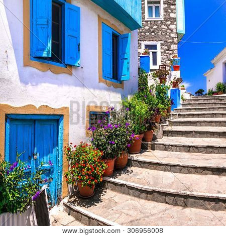 Traditional colorful Greece series - charmng streets of Kokkari village, Samos island