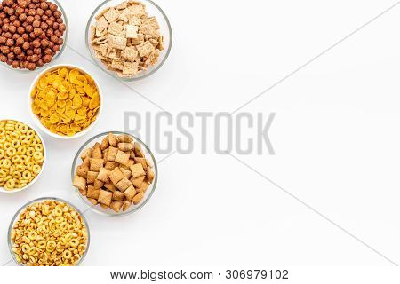 Cereals, Oatflakes And Cornflakes For Healthy Breakfast On White Background Top View Mock Up