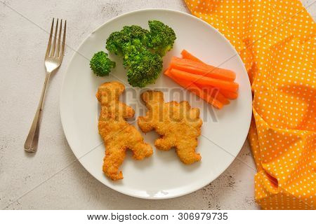 Kids Food. Dinosaur Shaped Chicken, Fish Or Turkey Nuggets, Ready To Eat.
