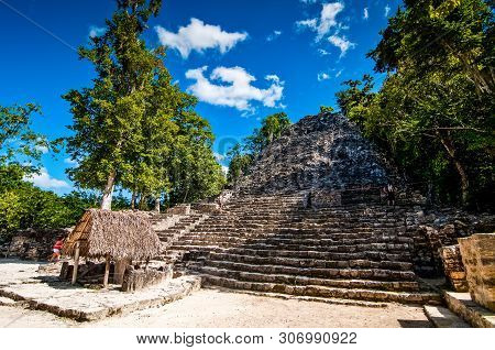 Coba, Mexico - November 16, 2010. Archaeological Site Of Coba With Tourist And Pyramid