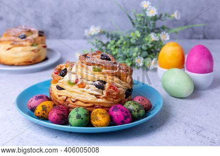 Craffin (cruffin) With Raisins, Nuts And Candied Fruits. Easter Bread Kulich And Painted Eggs. Easte