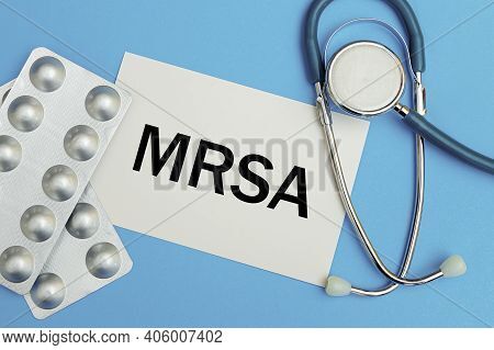 Card With Text Mrsa Methicillin-resistant Staphylococcus Aureus, Pills And Stethoscope, Medical Conc