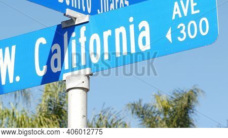 California Street Road Sign On Crossroad. Lettering On Intersection Signpost, Symbol Of Summertime T