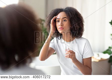 Water Balance, Beauty Care And Start Diet In Morning. Sad And Unhappy Millennial African American Fe