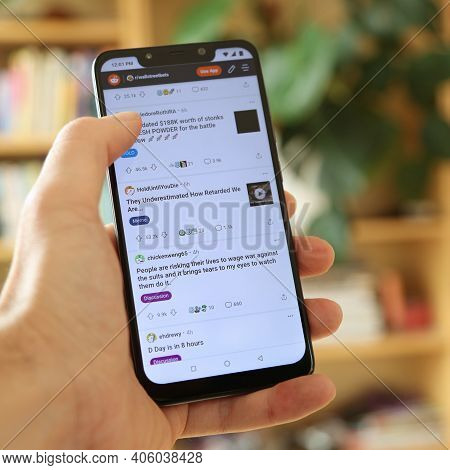 Warsaw, Poland - January 29, 2021: User Browsing Reddit Social Sharing Website Wallstreetbets Subred