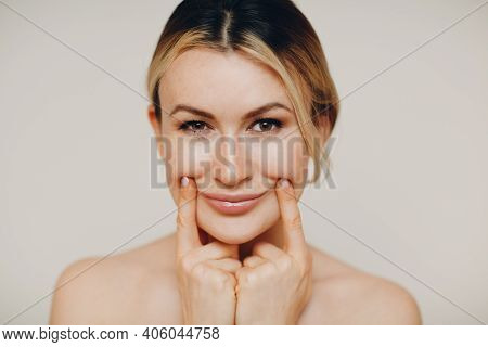 Young Adult Doing Facial Gymnastics Self Massage And Rejuvenating Exercises Face Building For Skin A