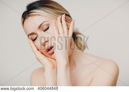 Young Adult Doing Facial Gymnastics Self Massage And Rejuvenating Exercises Face Building For Skin A