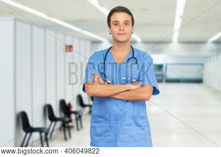 Friendly Caucasian Male Nurse With Short Hair At Vaccination Station Is Ready For Vacinating Patient