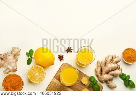 Immunity Boosting Drink And Ingredients On White Background, Flat Lay. Space For Text