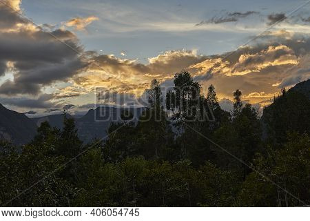 Beautiful And Warm Sunset With Dramatic Sky And Illuminated Clouds Over The Gocta Waterfalls At Gold