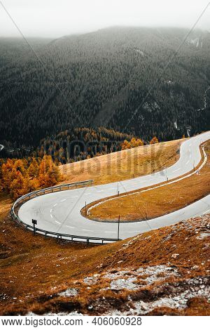 Portrait Photography Of Autumn Nockalm Road With Dark Black Mountains. Very Beautiful Landscape