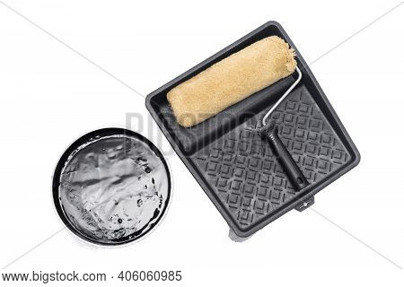Paint Roller And Painting Cuvette Isolated On The White Background.