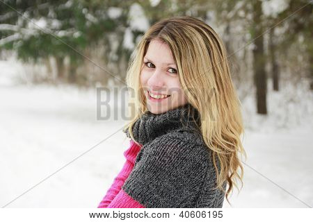 Young Woman In A Park In Winter