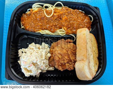 Spaghetti And Fried Chicken Plate With Piece Garlic Bread And Mac Salad At Zippy's.