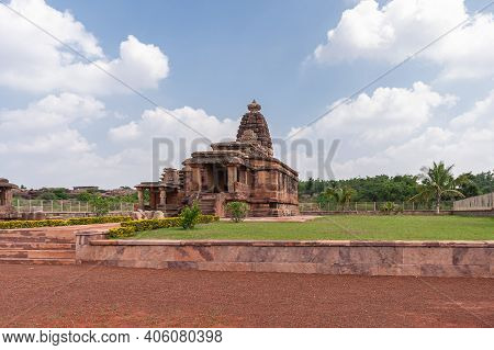 Aihole, Karnataka, India - November 7, 2013: Huchchimalli Gudi Or Temple From A Distance Set In Gree