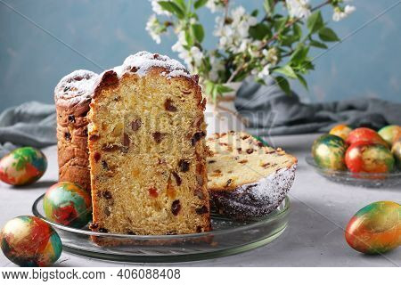 Easter Cake Craffin And Marble Colorful Eggs On A Light Blue Background. Concept Of The Spring Ortho