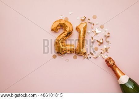 Happy 21st Anniversary Party. Champagne Bottle With Gold Number Balloon.