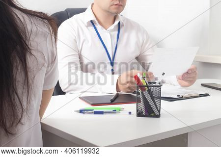 A Male Gynecologist Doctor Examines A Woman S Hormone Test Results. The Concept Of Female Libido, Hy