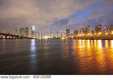 Night Florida Miami City Skyline. Usa Skyscrappers Downtown. Landscape Of Twighlight Town